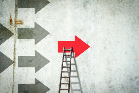 Arrows on a concrete wall. Red arrow, right direction. Stairs. leadership concept. team. business finance backgroundの写真素材