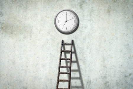 Stairs to the clock, on a concrete wall. time concept. The importance of time. business. lifestyle. abstract background. background.の写真素材