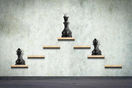 Black pawn and chess queen. career growth. ladder up. The concept of success, growth and development. business. lifestyle. abstraction. background.の写真素材