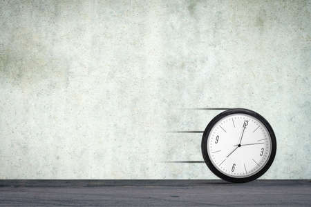 Clock in a car wheel, rolls along the road. Time concept.Copy space. business. lifestyle. background.の写真素材