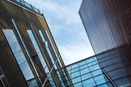 Malmo. Sweden. July 29, 2019. Beautiful modern glass and brick building. Bottom view Architectureのeditorial素材