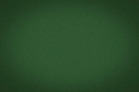 Dark green poker background. Vignette. Gambling backgroundの写真素材