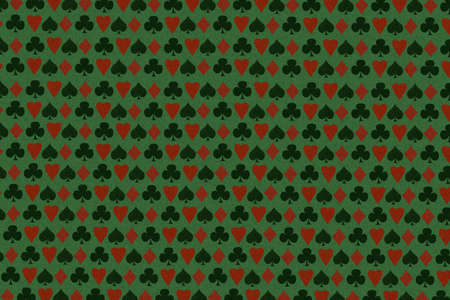 Dark green vintage poker background with different card suits. Gambling. background.の写真素材