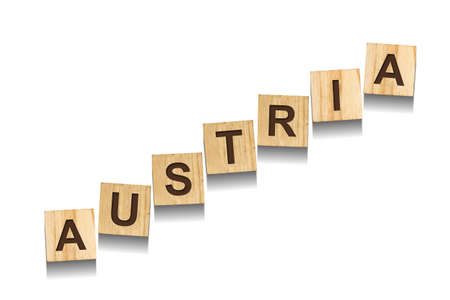 Austria, word on wooden blocks. isolated on a white background. Signs and Symbols.の写真素材