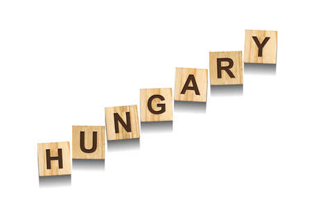 Hungary, word on wooden blocks. isolated on a white background. Signs and Symbols.の写真素材