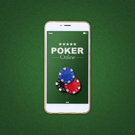 Smartphone and poker chips on a green background. Online poker concept. Gambling. background.の写真素材