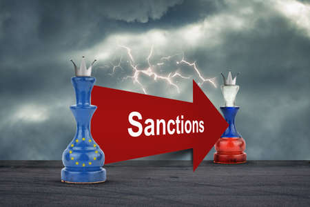 EU sanctions against Russia. Chess queens in the colors of the European Union and the Russian flags. The collapse of the economy. economic blockade. economic background.の写真素材