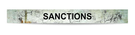 Sanctions, word on cracked concrete. Isolated on white background.Economic and political sanctions....