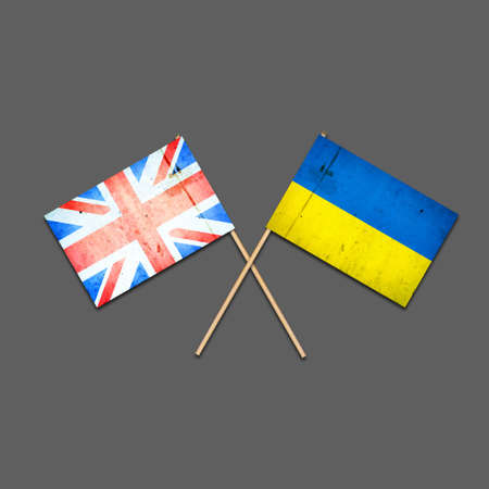 Flags of England and Ukraine, on wooden sticks. Isolated on a gray background. international political relations. 3D illustration. commonwealth. support. political economic background. politics.の写真素材