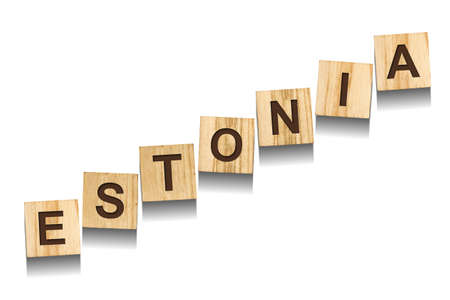Estonia, word on wooden blocks. isolated on a white background. Signs and Symbols.の写真素材