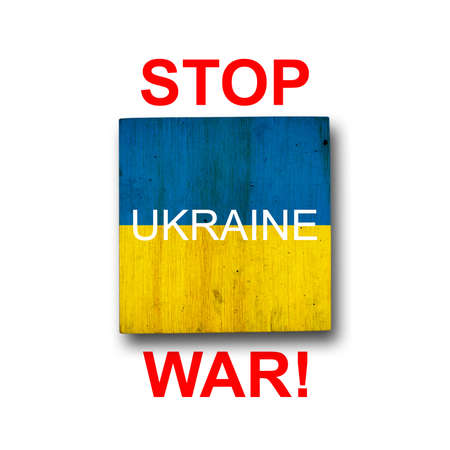 stop war. Flag of Ukraine on a wooden block. isolated on white background. politics.の写真素材