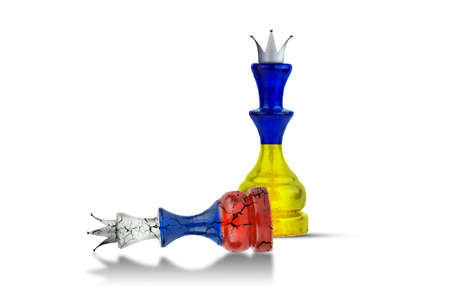 Chess Queen in the colors of the Flag of Ukraine, and a recumbent cracked chess queen in the colors of the Russian flag. Ukraine's victory over Russia in the war. isolated on white background. politics. design object.の写真素材