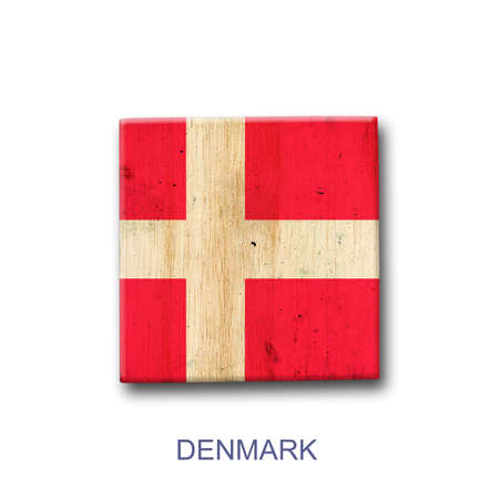 Denmark flag on a wooden block. isolated on white background. Signs and symbols. flags.の写真素材