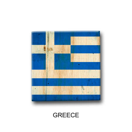 Greece flag on a wooden block. Isolated on white background. Signs and symbols.の写真素材