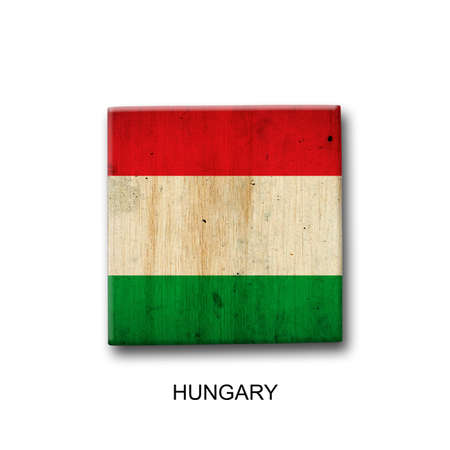 Hungary flag on a wooden block. isolated on white background. Signs and symbols. flags.の写真素材