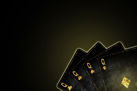 Four Queens, grunge cards in black background.Copy Space. Poker background.Playing cards. Gambling.の写真素材