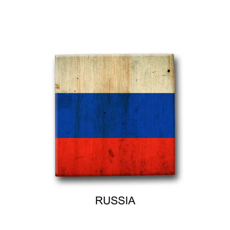 Russia flag on a wooden block. isolated on white background. Signs and symbols. flags.の写真素材