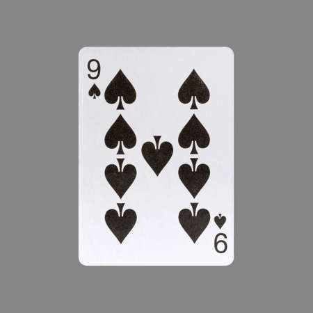 Nine of Spades. Isolated on a gray background. Gamble. playing cards. Cards.の写真素材