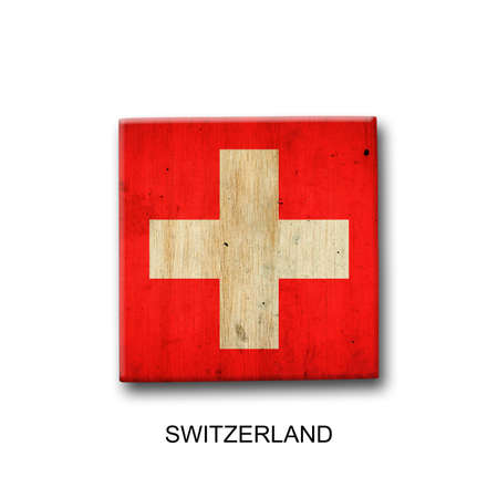 Switzerland flag on a wooden block. isolated on white background. Signs and symbols. flags.の写真素材