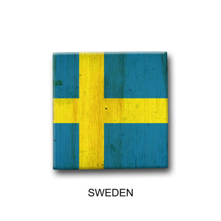 Sweden flag on a wooden block. isolated on white background. Signs and symbols. flags.の写真素材