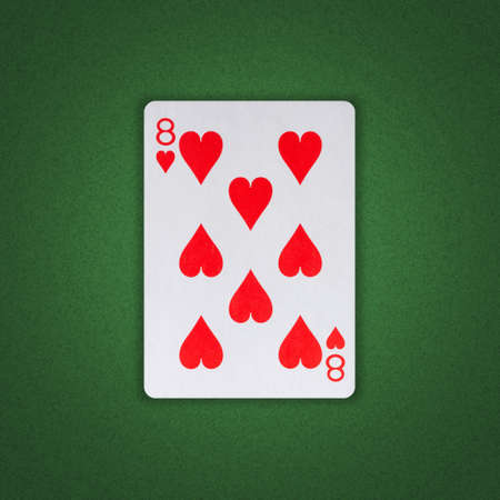 Eight of Hearts on a green poker background. Gamble. playing cards. background.の写真素材