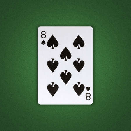 Eight of Spades on a green poker background. Gamble. playing cards. background.の写真素材