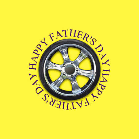 Happy Father's Day background. Auto wheel, on a yellow background. copyspace. Place for text. Festive background. holidays. Congratulations.の写真素材