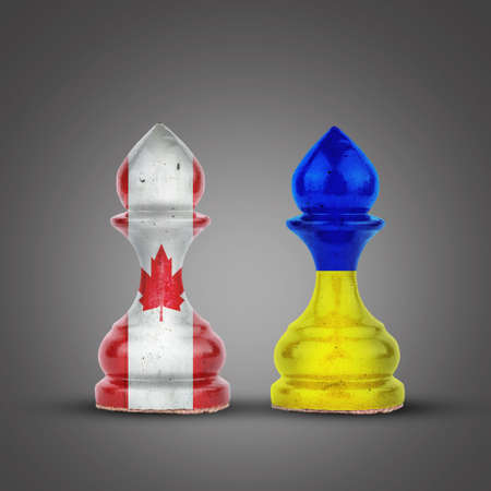 Pawns in the colors of the flag of Ukraine and Canada, on a gray background. Support, union, and interaction. sport. politics. business. strategy.の写真素材