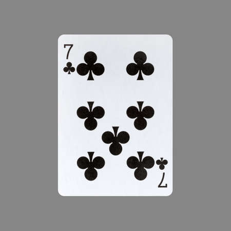 Seven of Clubs. Isolated on a gray background. Gamble. playing cards. Cards.の写真素材
