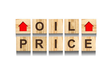 oil price. Word up arrows on wooden blocks. isolated on white background. The rise in oil prices. design element. economy. business.の写真素材