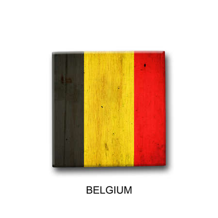 Belgium flag on a wooden block. isolated on white background. Signs and symbols. flags.の写真素材