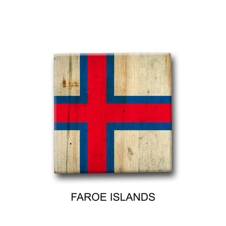Faroe Islands flag on a wooden block. isolated on white background. Signs and symbols. flags.の写真素材