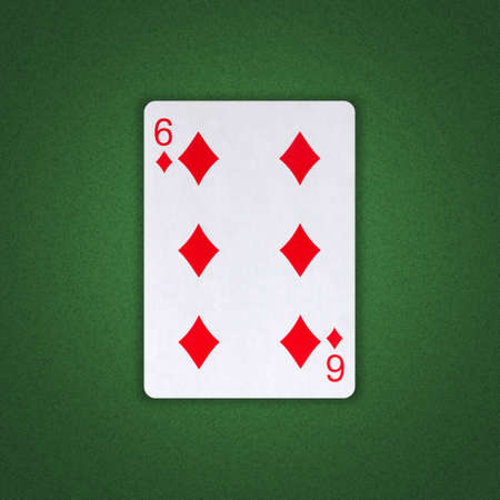 Six of Diamonds on a green poker background. Gamble. playing cards. background.の写真素材