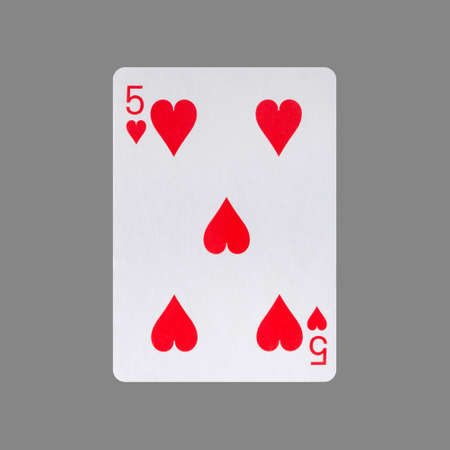 Five of Hearts. Isolated on a gray background. Gamble. Playing cards.の写真素材