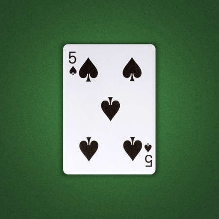 Five of Spades on a green poker background. Gamble. Playing cards.の写真素材