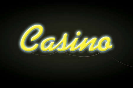 Casino, yellow neon inscription, isolated on a dark background. Poker. Gambling.の写真素材