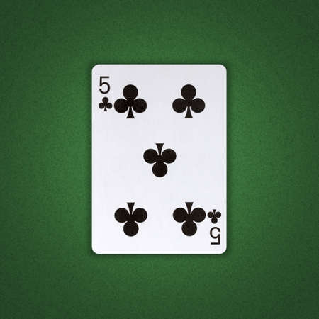 Five of Clubs on a green poker background. Gamble. Playing cards.の写真素材