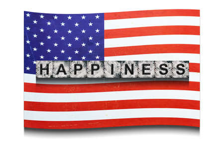 happyness. Word on stone blocks, on the background of the flag of America. isolated on white background. design element. vacation. background.の写真素材