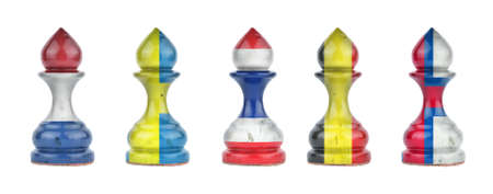 Pawns in the colors of the flag of different countries. isolated on a white background. sport. politics. business. strategy.の写真素材