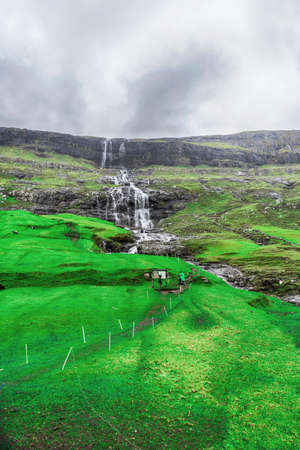 Beautiful waterfall. Faroe Islands. Denmark Europe Landscapes Natureの写真素材