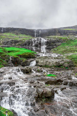 Beautiful waterfall. Faroe Islands. Denmark Europe Landscapes Natureの写真素材