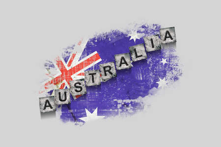 Australia, words on stone blocks, on grunge background of Australia flag. isolated on white background. design element. Signs and symbols.Countries.の写真素材