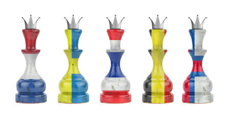 Chess queens in the colors of the flag of different countries. isolated on a white background. sport. politics. business.strategy.の写真素材