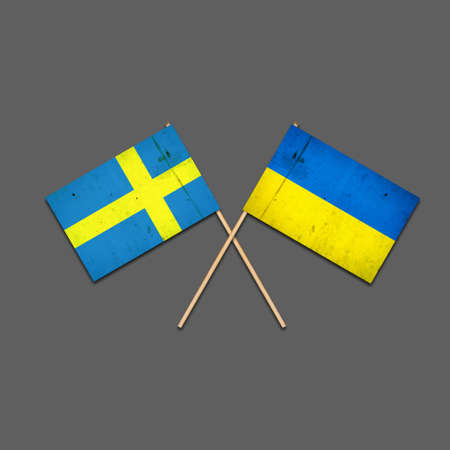 Flags of Sweden and Ukraine, on wooden sticks. Isolated on a gray background. international political relations. commonwealth. support. political economic background.の写真素材