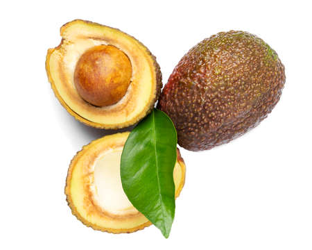 Half and whole avocado, with leaf, isolated on white background. Top view Berries.の写真素材
