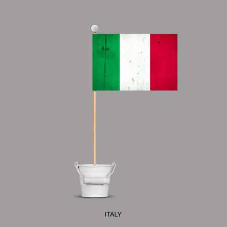 Grunge flag of Italy on a stick, in a small bucket. Isolated on a gray background. Signs and symbols. Flags.Design element.の写真素材