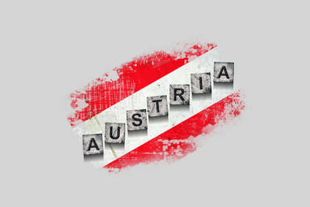 Austria, words on stone blocks, on grunge background of Austria flag. Isolated on white background. Design element. Signs and symbols.Countries.の写真素材