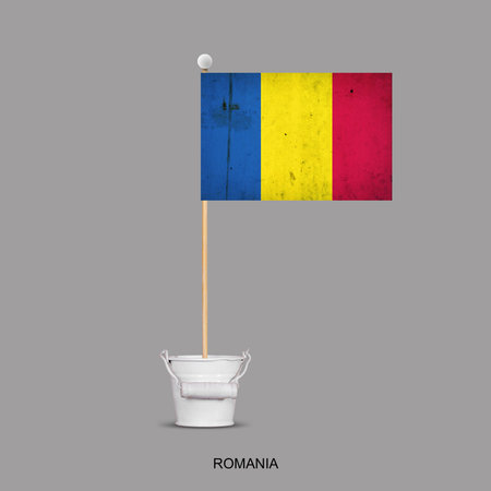 Grunge Flag of Romania on a stick, in a small bucket. Isolated on a gray background. Signs and symbols. Flags.Designの写真素材