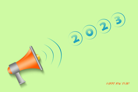 2023 and a megaphone on a green background. New year concept. copy space. Holidays. Background.