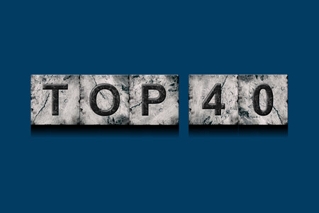 Top 40, words, above different numbers, on a dark blue background. Alphabet on stone blocks.Rating. Rating concept.の写真素材